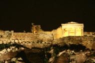 The Acropolis at night is a stunning sight above Athens.